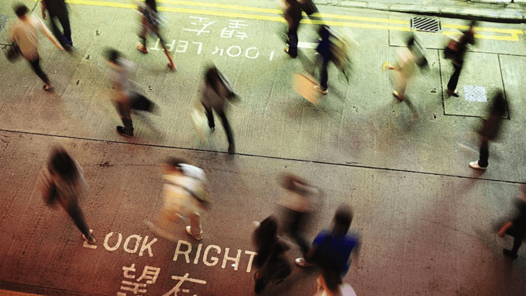Red lights are projected onto the sidewalk to ensure pedestrian safety